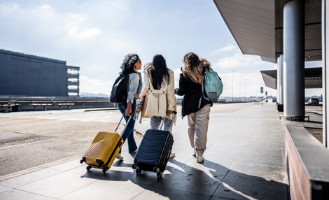 friends walking at the airport.jpg