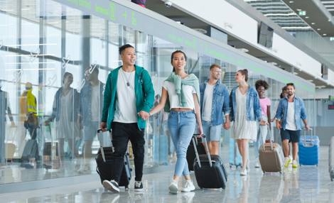 Passengers walking at the airport.jpeg