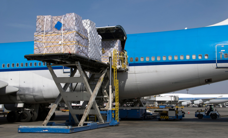 Freighter aircraft being loaded with cargo shipments.jpg