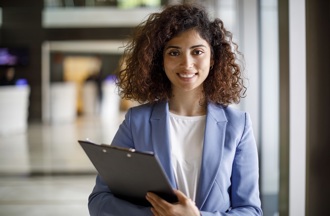 business woman smiling at the camera